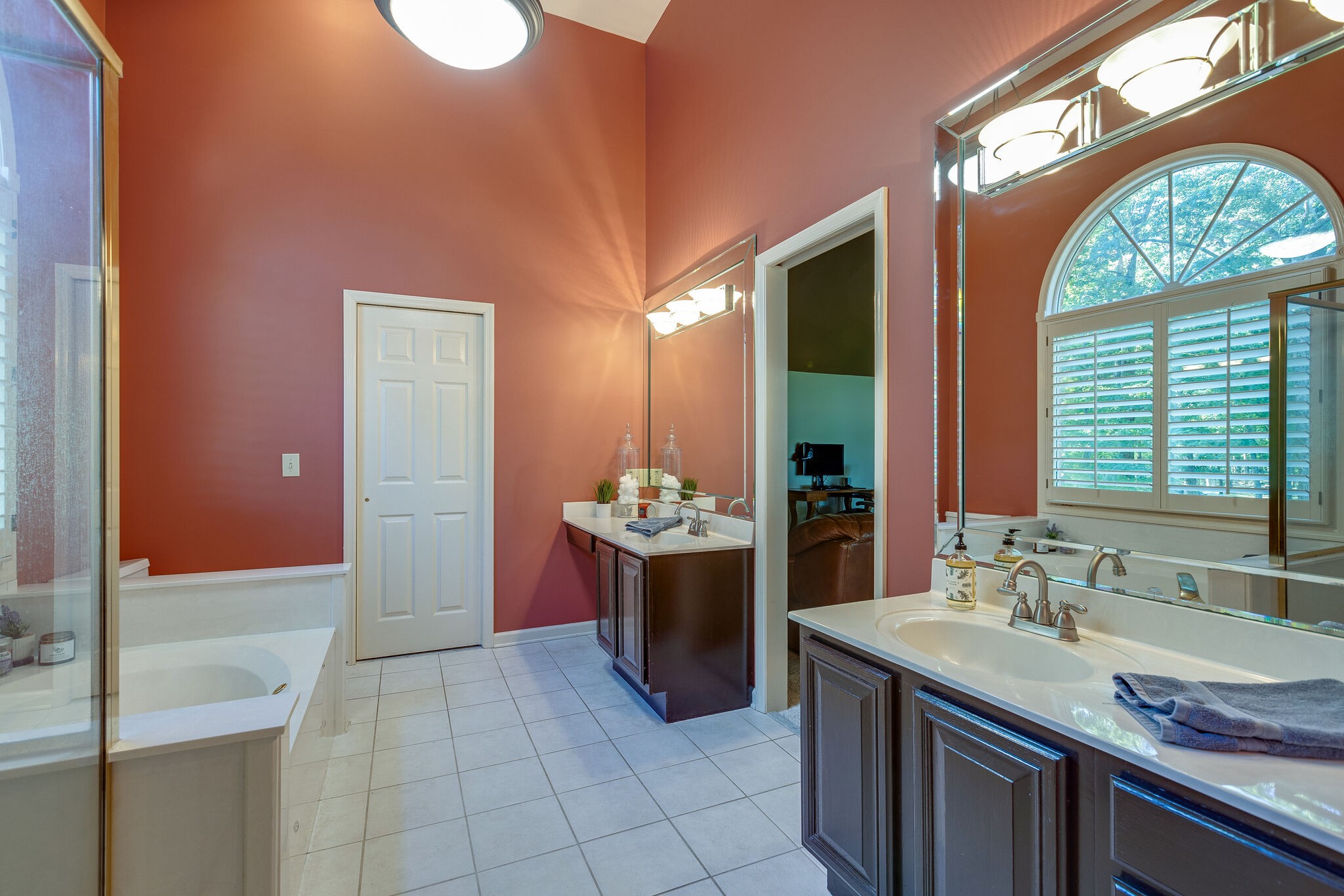 4248 Warren Road Franklin, TN 37067 - Photo 52 of 69 a bathroom with a granite countertop sink and a mirror