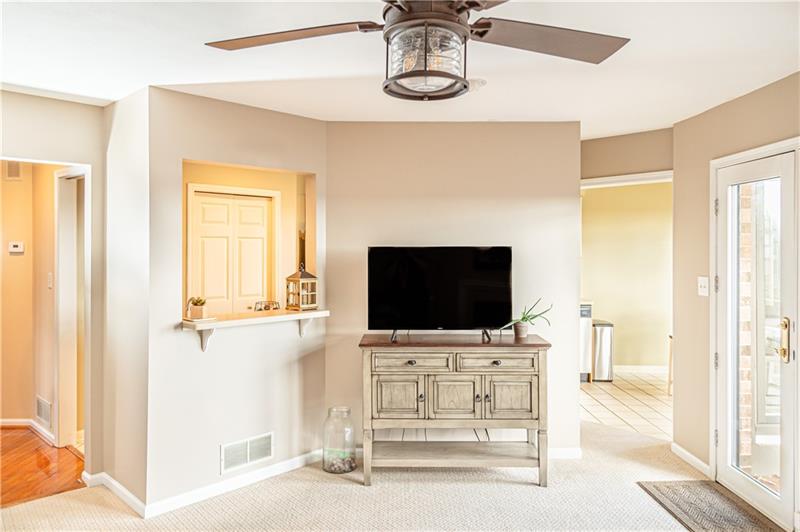 Family room looking towards kitchen area.