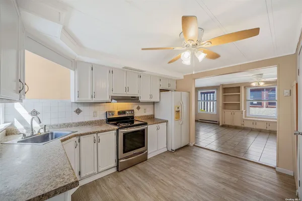 $139,900 | 114 Village Circle West, Unit 114, Manorville, NY 11949