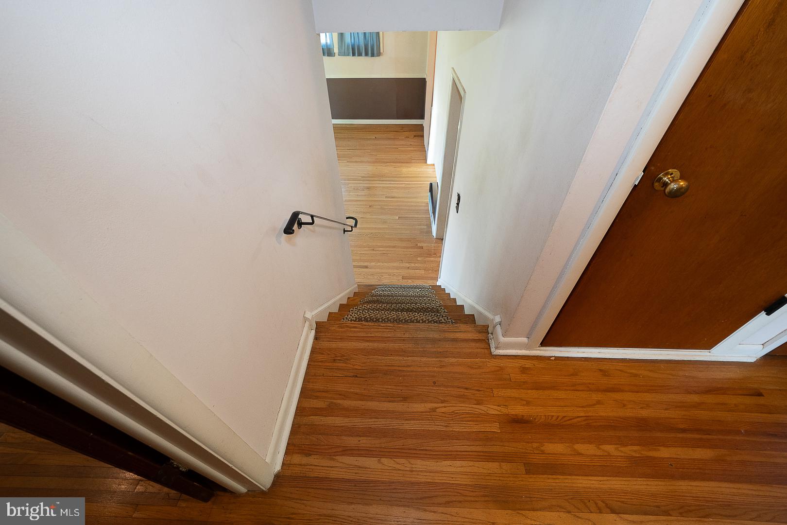 437 Rittenhouse Circle Havertown, PA 19083 - Photo 16 of 55 Inviting staircase with warm wood tones.
