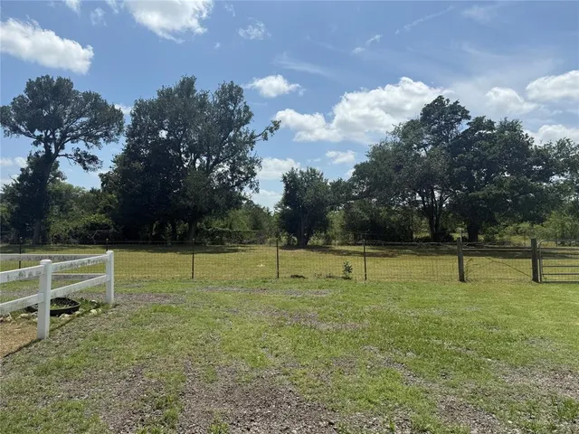 a view of park with swings and slides