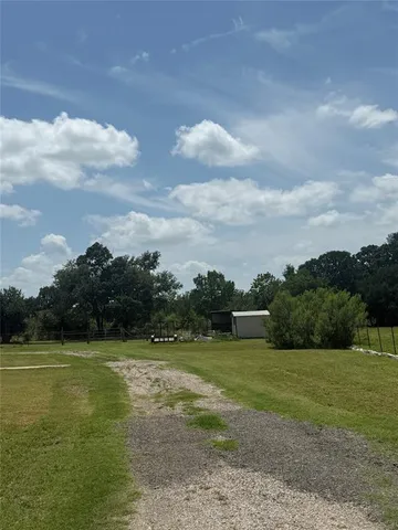 a view of a golf course with a lake
