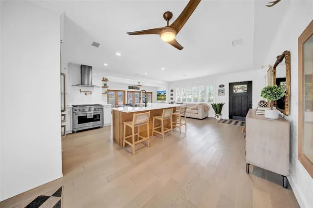 a living room with furniture and a table