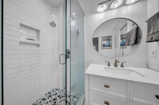 a view of a swimming pool with sitting area