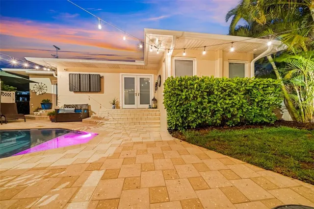 a view of a house with a street