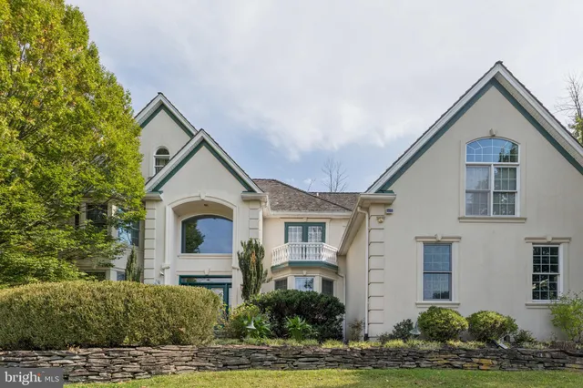 a view of a chairs and table in the patio