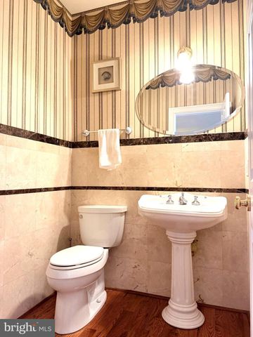 a view of a house with a yard and entertaining space