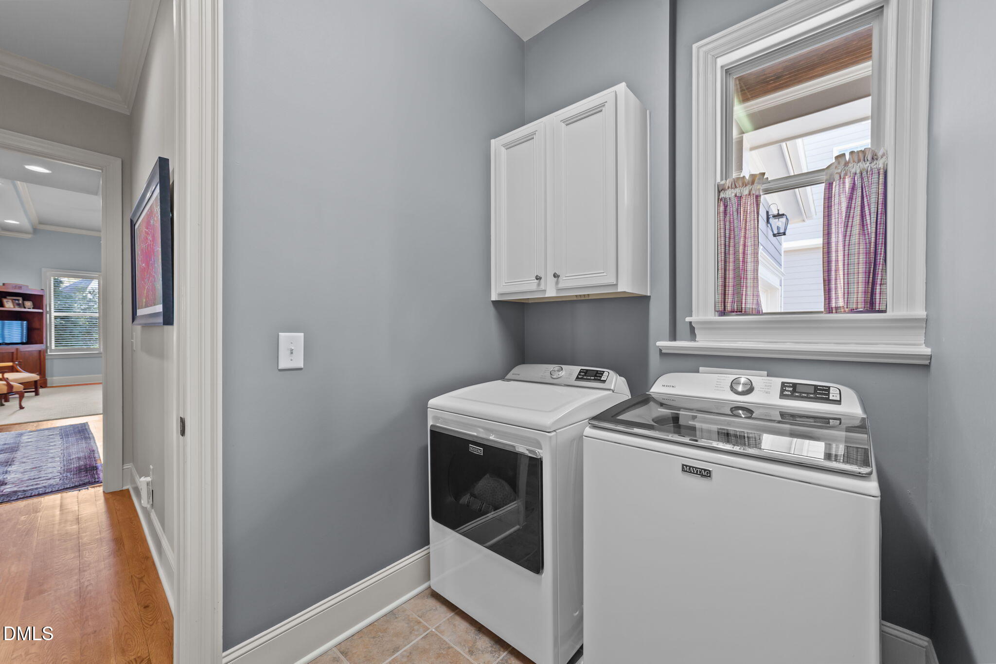 1859 Versa Court Apex, NC 27502 - Photo 22 of 46 a utility room with dryer and washer