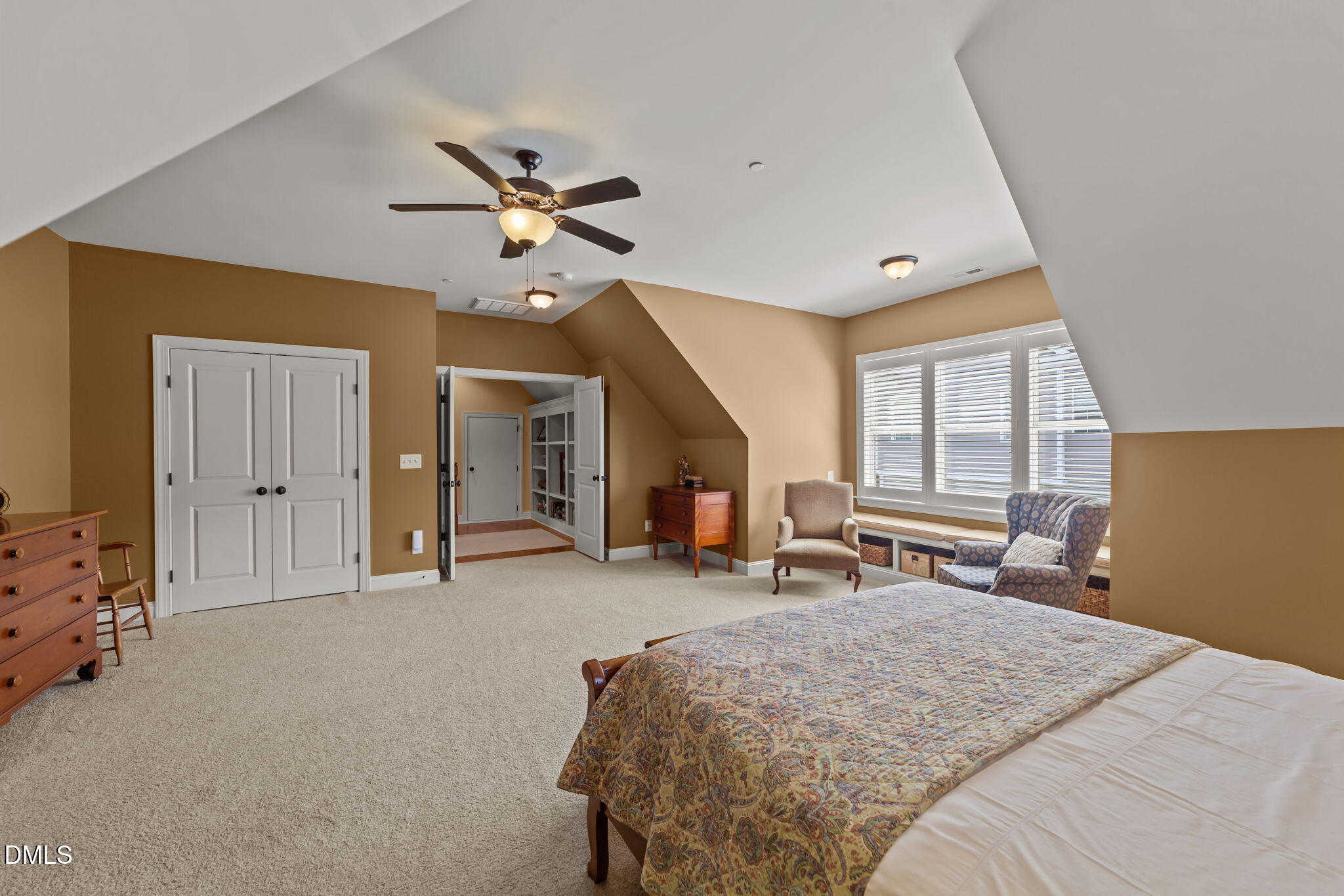 1859 Versa Court Apex, NC 27502 - Photo 27 of 46 a bedroom with furniture and a large window