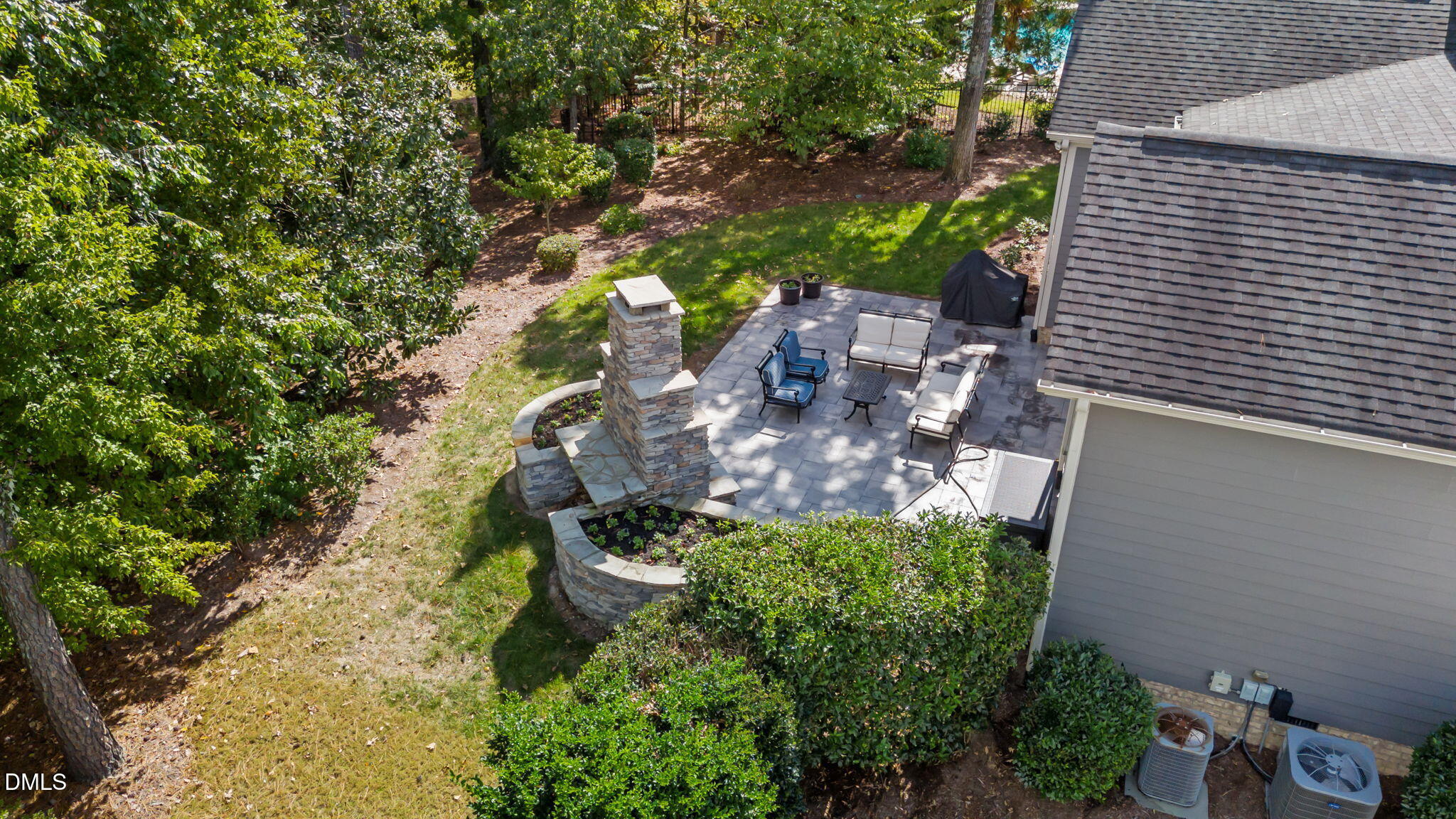 1859 Versa Court Apex, NC 27502 - Photo 37 of 46 a backyard of a house with lots of green space