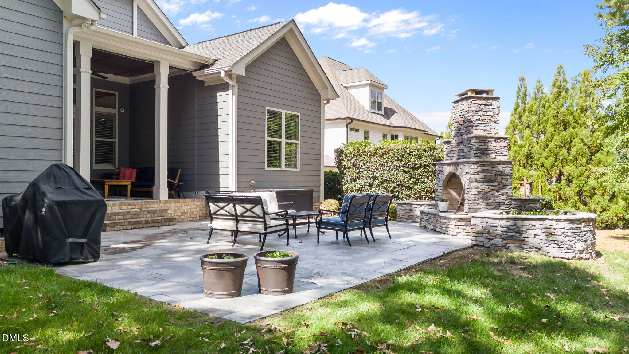 1859 Versa Court Apex, NC 27502 - Photo 40 of 46 a view of a house with backyard and sitting area
