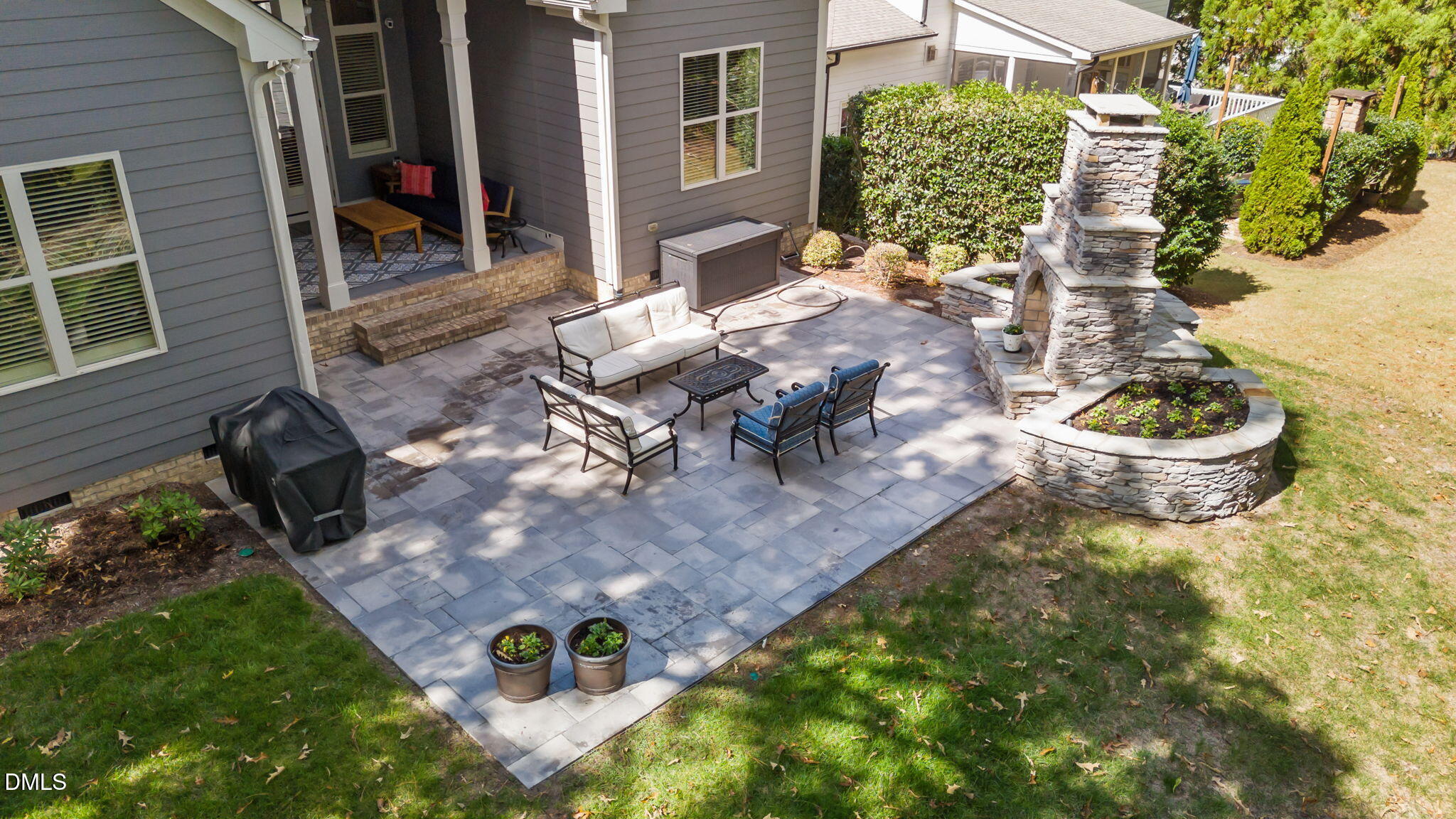 1859 Versa Court Apex, NC 27502 - Photo 41 of 46 a view of a backyard with sitting area