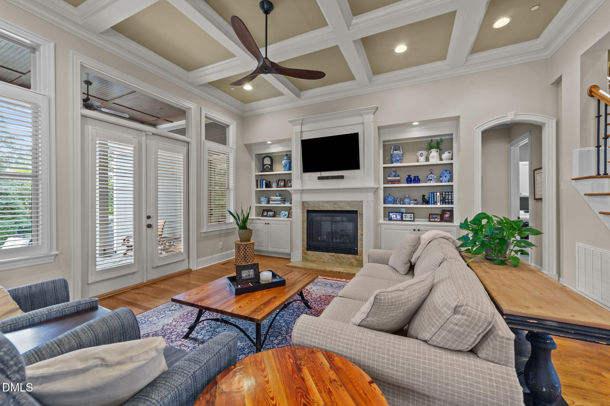 1859 Versa Court Apex, NC 27502 - Photo 10 of 46 a living room with furniture fireplace and a flat screen tv