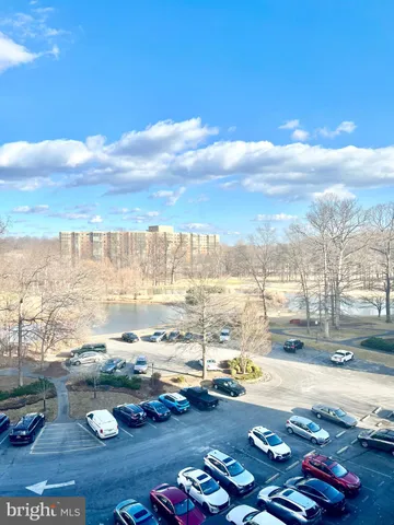 a view of an ocean and city