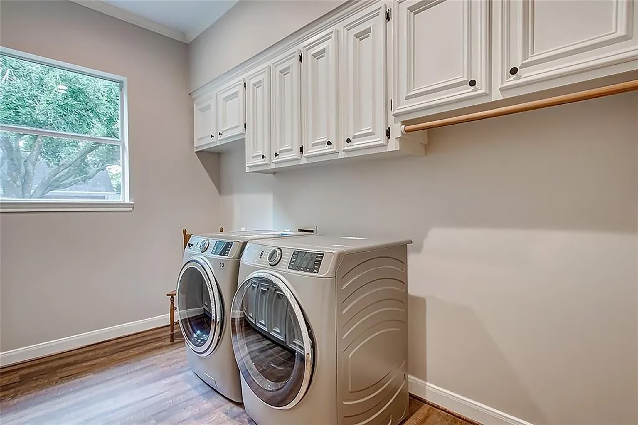 4421 Bowser Road Fulshear, TX 77441 - Photo 11 of 41 a utility room with dryer and washer