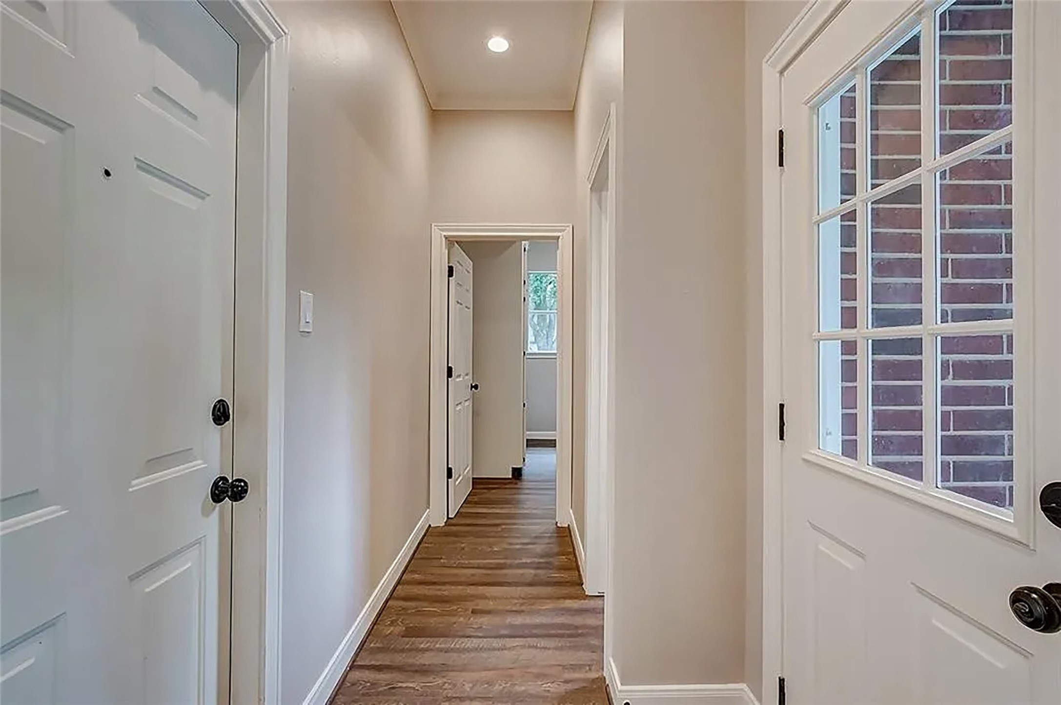 4421 Bowser Road Fulshear, TX 77441 - Photo 13 of 41 a view of a hallway with windows