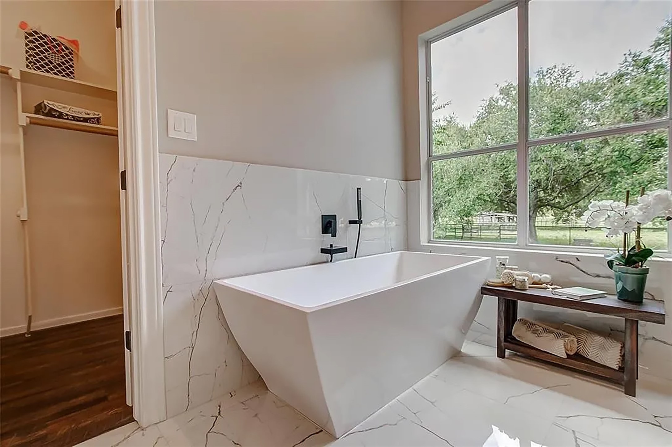 4421 Bowser Road Fulshear, TX 77441 - Photo 19 of 41 a living room with a sink furniture and a window
