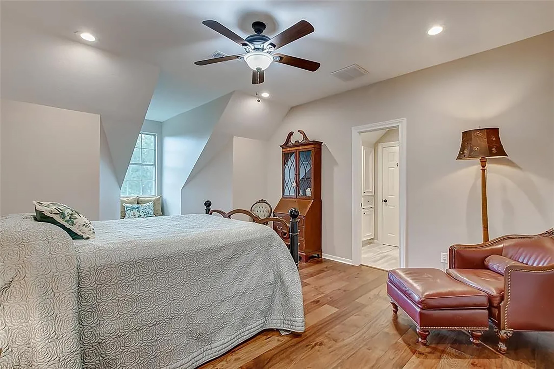 4421 Bowser Road Fulshear, TX 77441 - Photo 31 of 41 a bedroom with a bed and ceiling fan