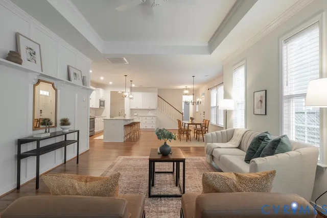 a view of a house with a yard and a garage