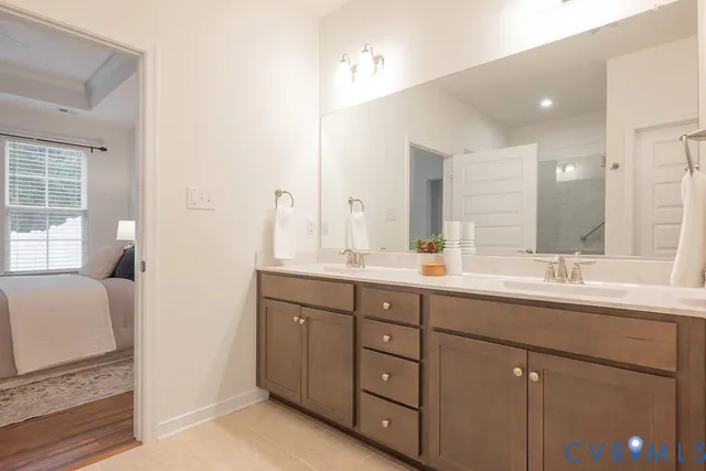 a bathroom with a shower and a sink