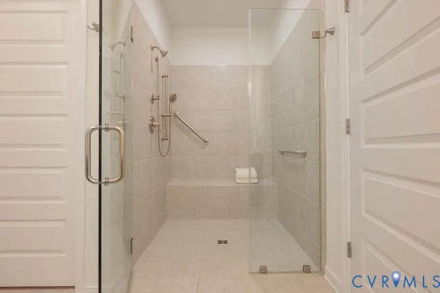 a bathroom with a sink double vanity and a mirror