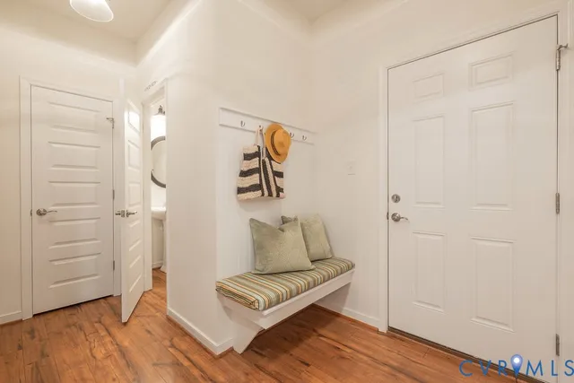 a bathroom with a glass shower door