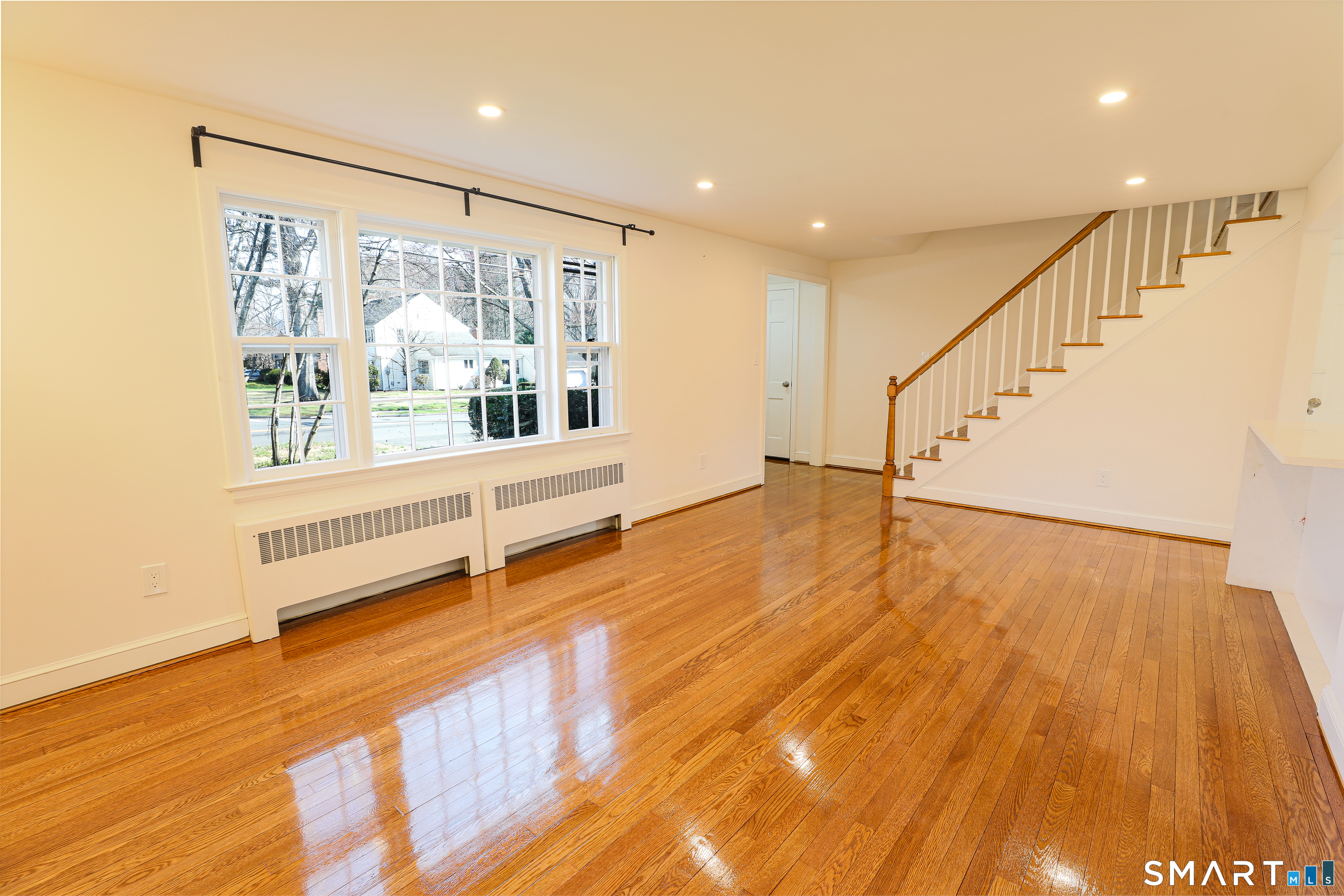 105 Hyde Road West Hartford, CT 06117 - Photo 3 of 25 a view of an entryway with wooden floor