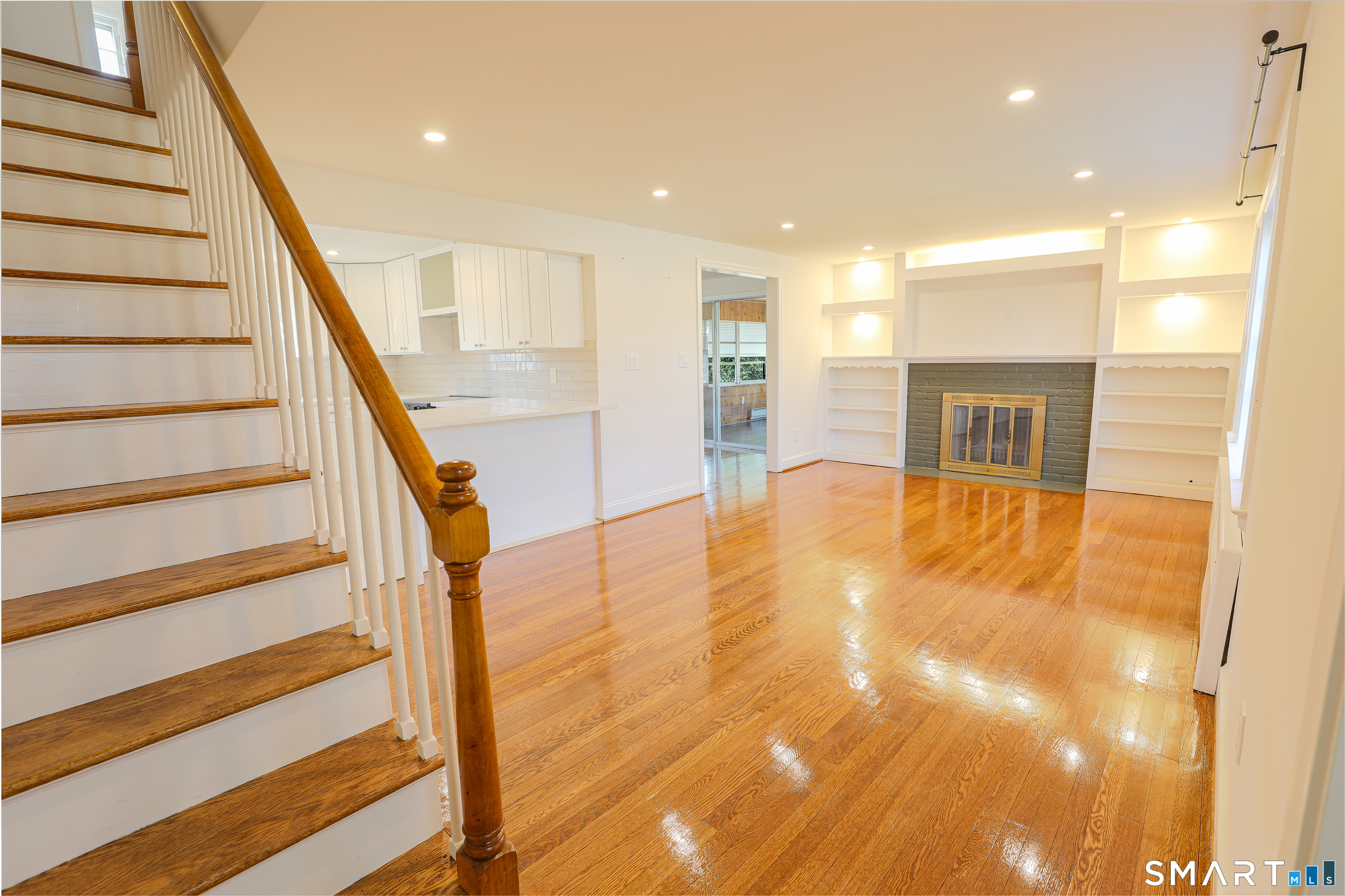 105 Hyde Road West Hartford, CT 06117 - Photo 5 of 25 a view of entryway and hall with wooden floor
