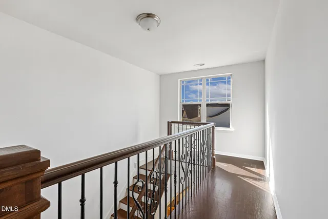 a view of entryway with wooden floor