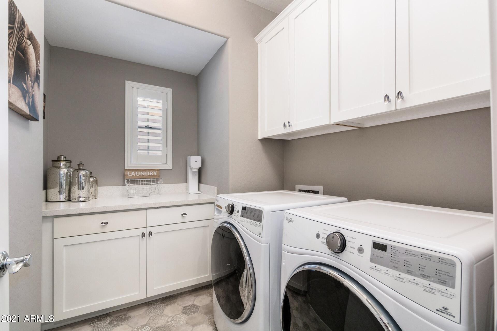 3935 East Rough Rider Road, Unit 1375 Phoenix, AZ 85050 - Photo 18 of 52 HUGE Laundry Room