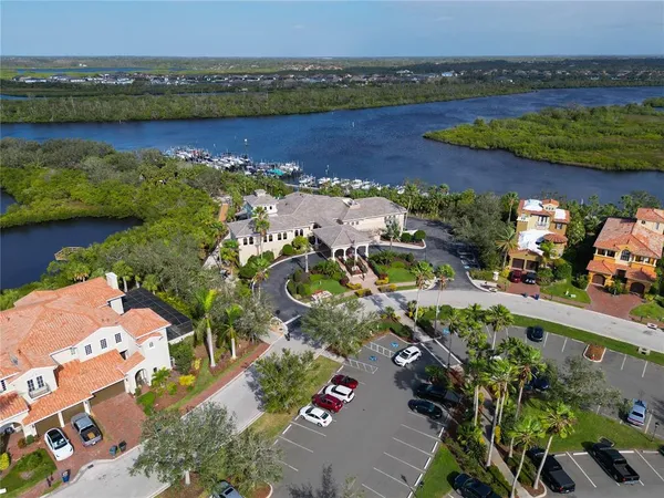 an aerial view of a houses with outdoor space