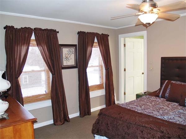31 Bridge Road Northampton, MA 01062 - Photo 12 of 20 a bedroom with a bed and a large mirror on the dresser