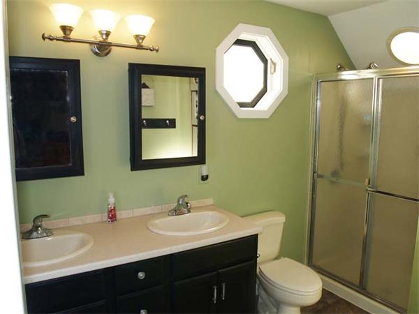 31 Bridge Road Northampton, MA 01062 - Photo 13 of 20 a bathroom with a toilet a sink and mirror