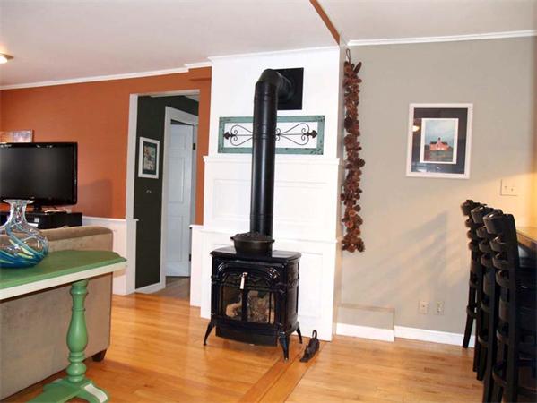 31 Bridge Road Northampton, MA 01062 - Photo 5 of 20 a view of a workspace with furniture and a flat screen tv