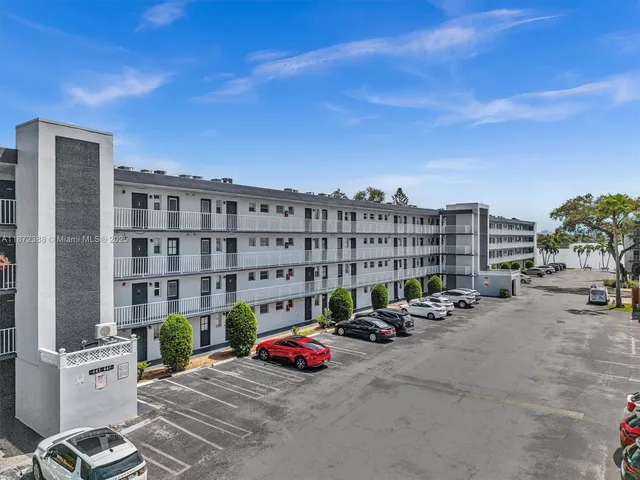 a cars parked in front of a building
