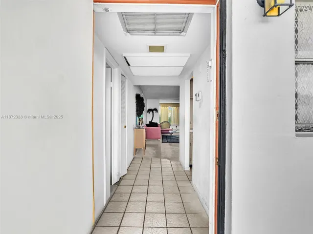 a kitchen with stainless steel appliances a refrigerator and a stove