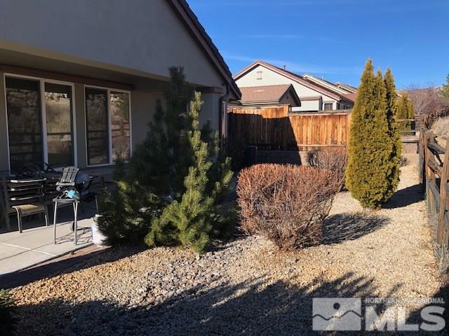 1310 Meridian Ranch Drive Reno, NV 89523 - Photo 11 of 13 a front view of a house with garden