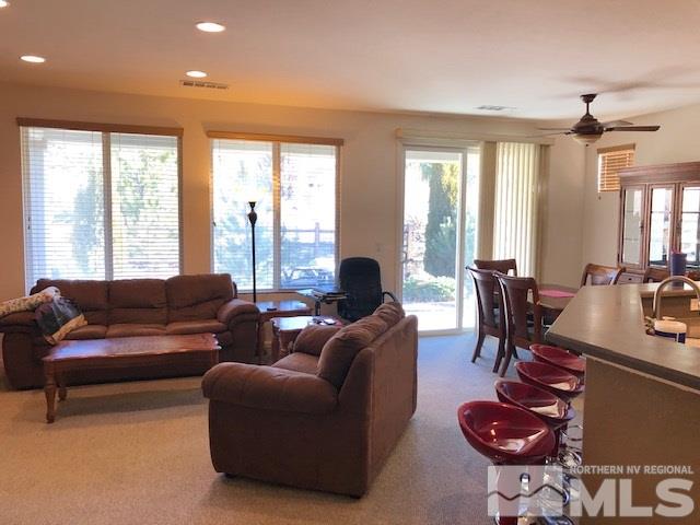 1310 Meridian Ranch Drive Reno, NV 89523 - Photo 3 of 13 a living room with furniture and a large window