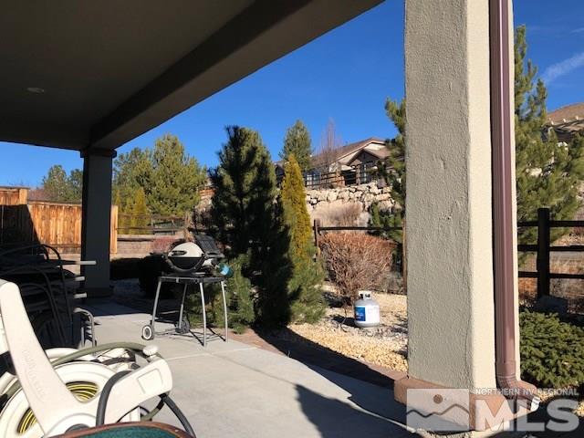 1310 Meridian Ranch Drive Reno, NV 89523 - Photo 10 of 13 a view of balcony with couple of chairs and couches