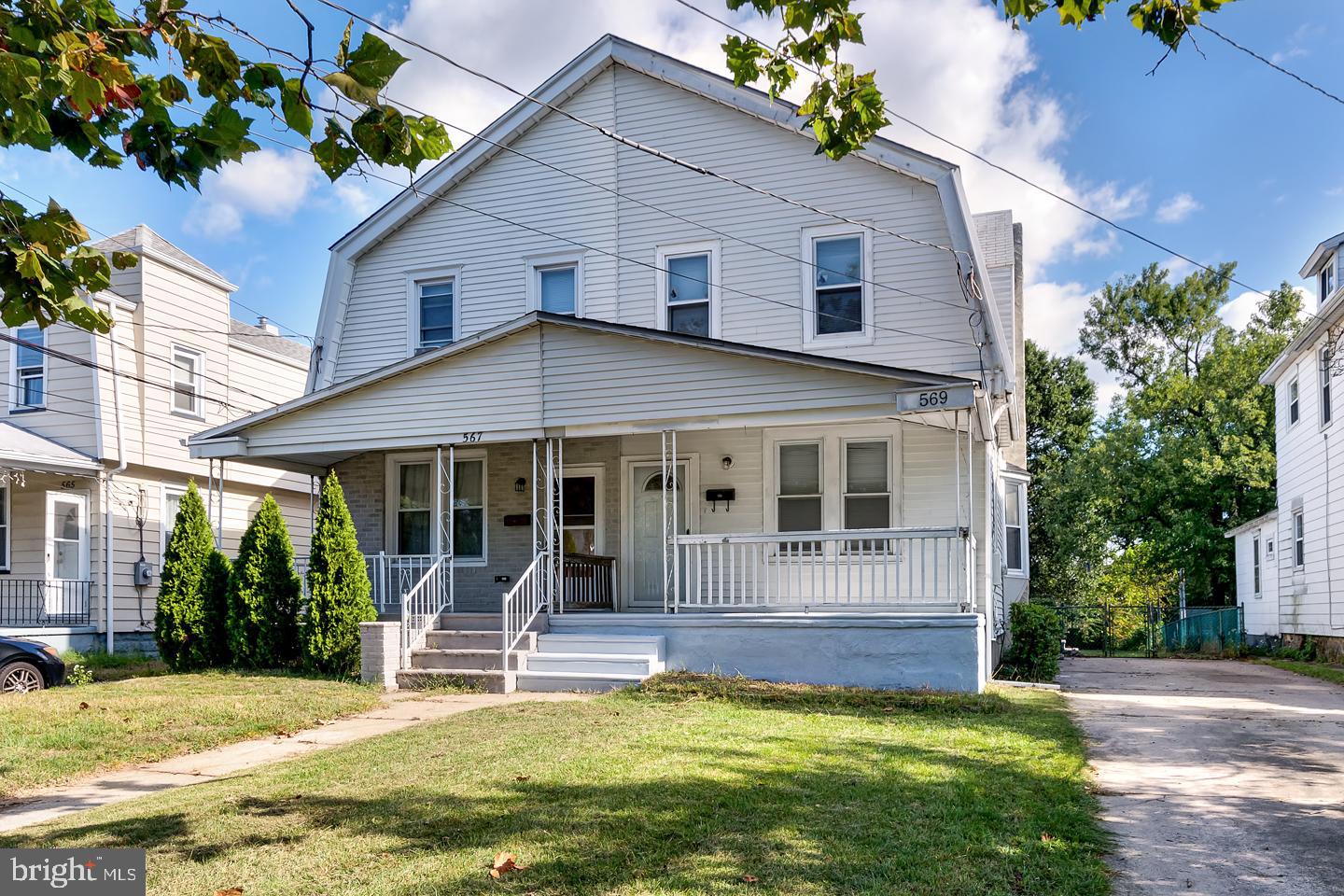 569 South Fairview Street Riverside, NJ 08075 - Photo 1 of 26 a view of a house with swimming pool and a porch