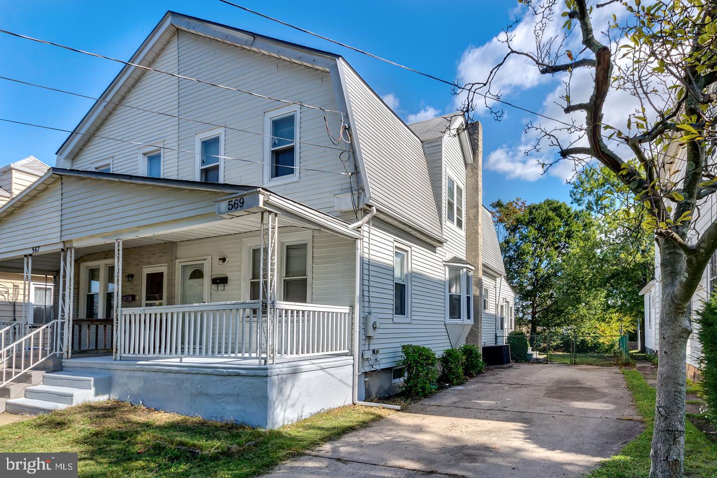 569 South Fairview Street Riverside, NJ 08075 - Photo 2 of 26 a front view of a house with a yard