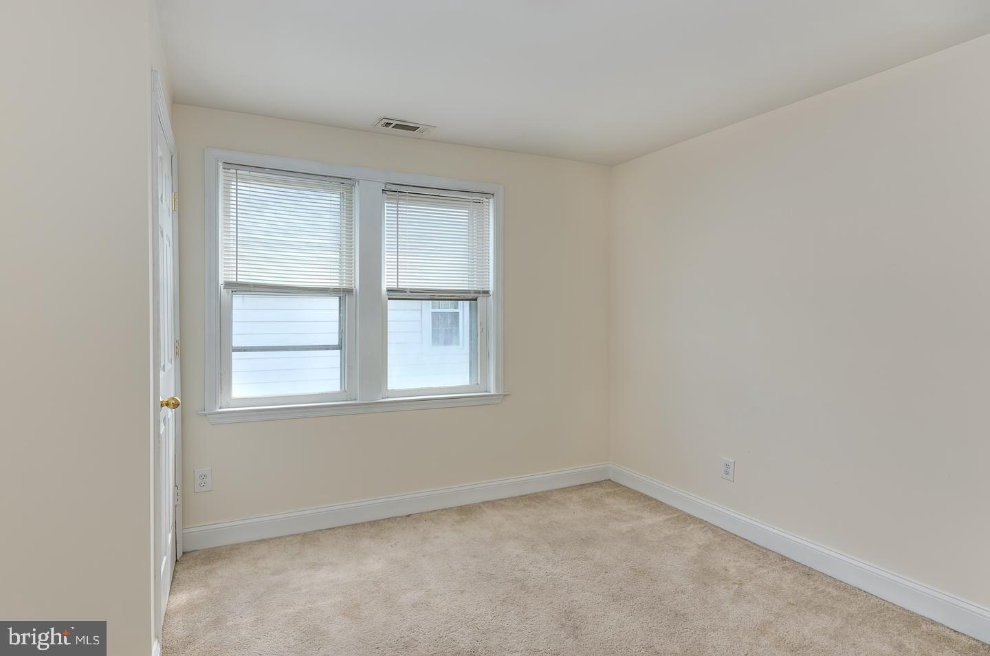 569 South Fairview Street Riverside, NJ 08075 - Photo 19 of 26 an empty room with a window