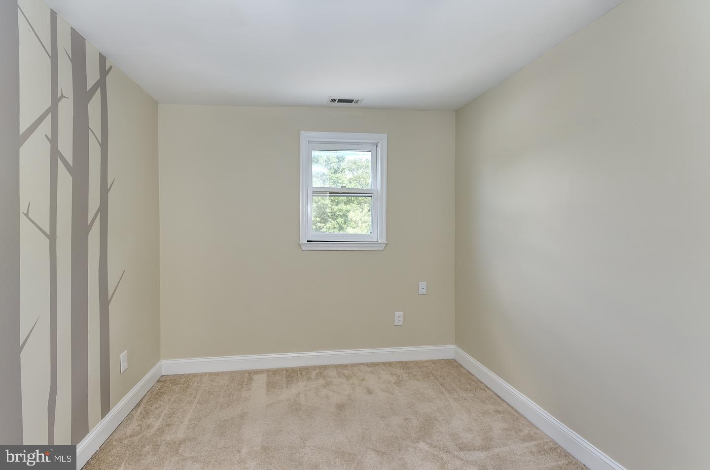 569 South Fairview Street Riverside, NJ 08075 - Photo 20 of 26 an empty room with windows
