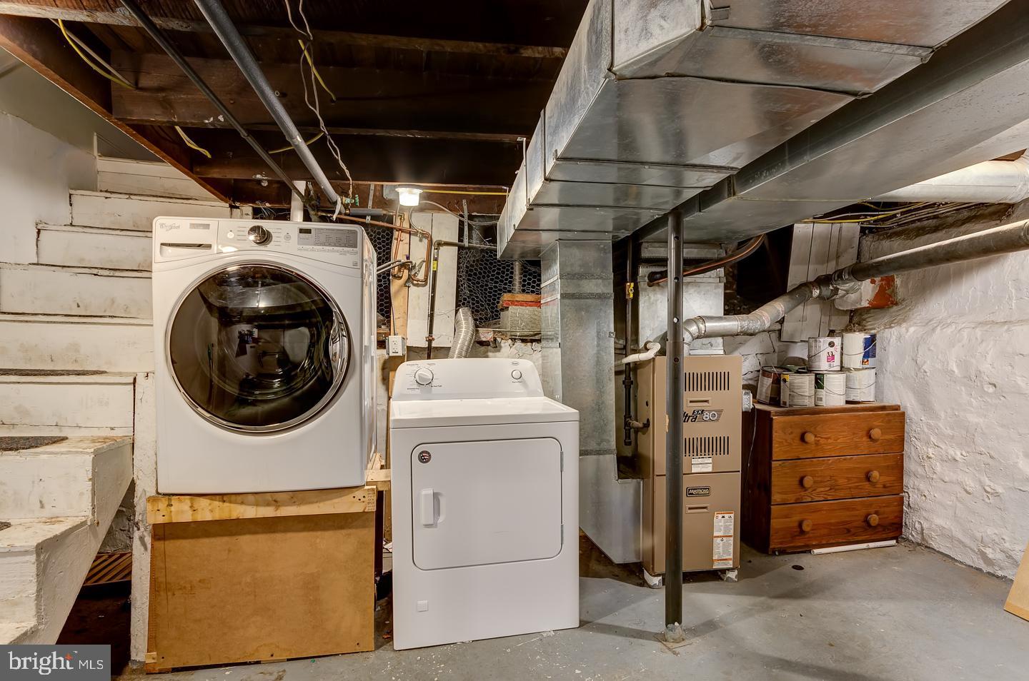 569 South Fairview Street Riverside, NJ 08075 - Photo 23 of 26 a utility room with dryer washer and stair
