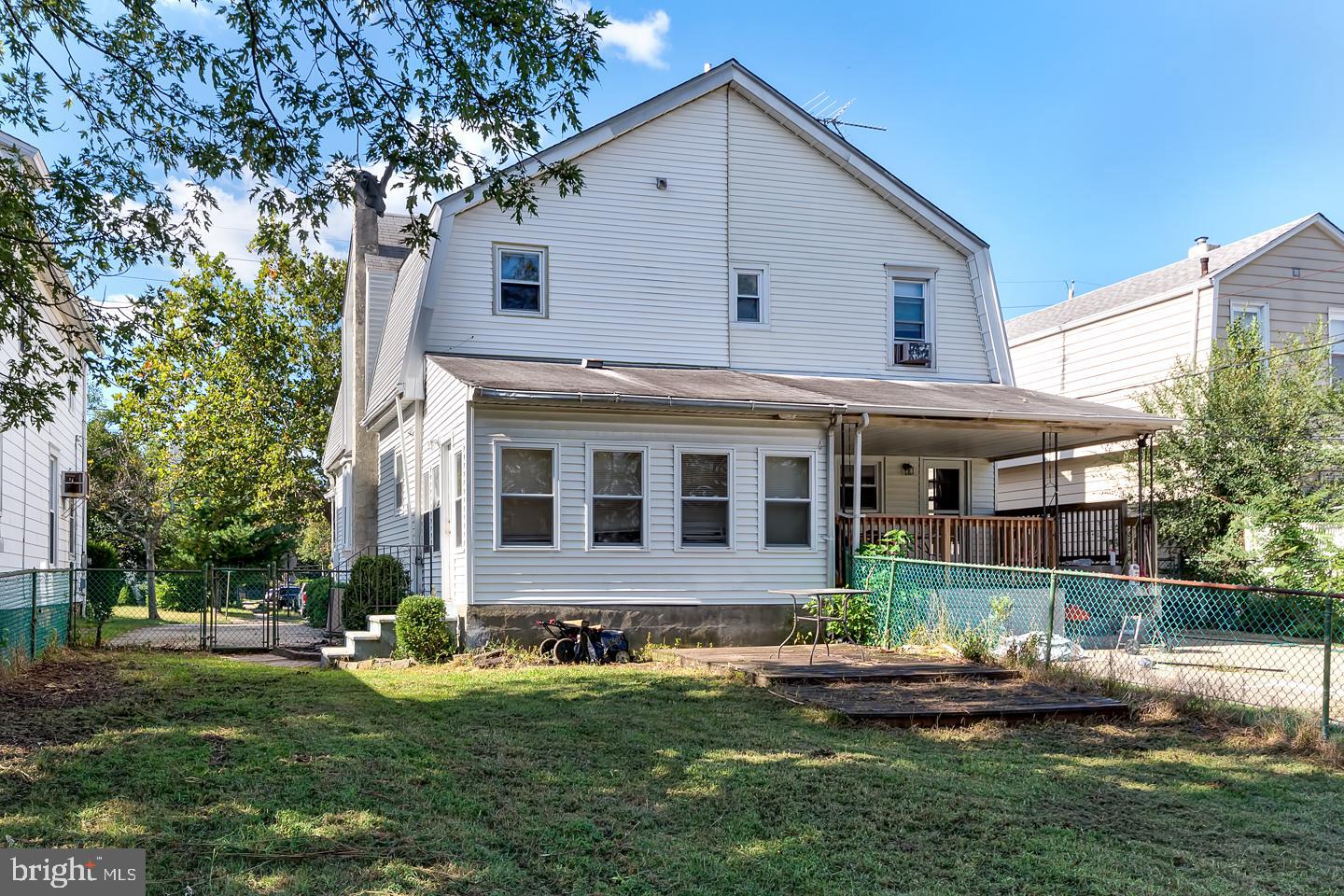 569 South Fairview Street Riverside, NJ 08075 - Photo 24 of 26 a front view of a house with a yard