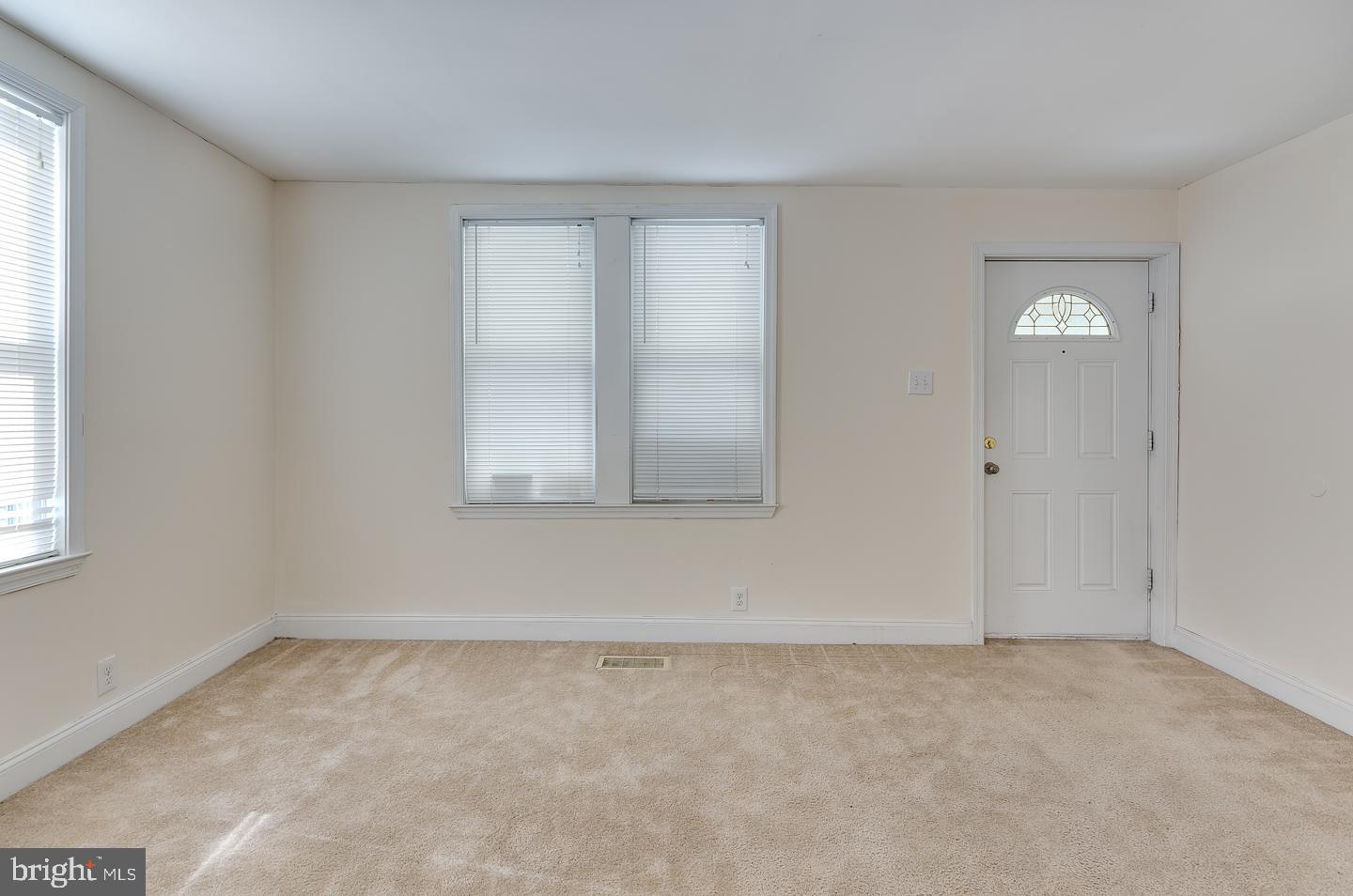 569 South Fairview Street Riverside, NJ 08075 - Photo 5 of 26 an empty room with windows and closet