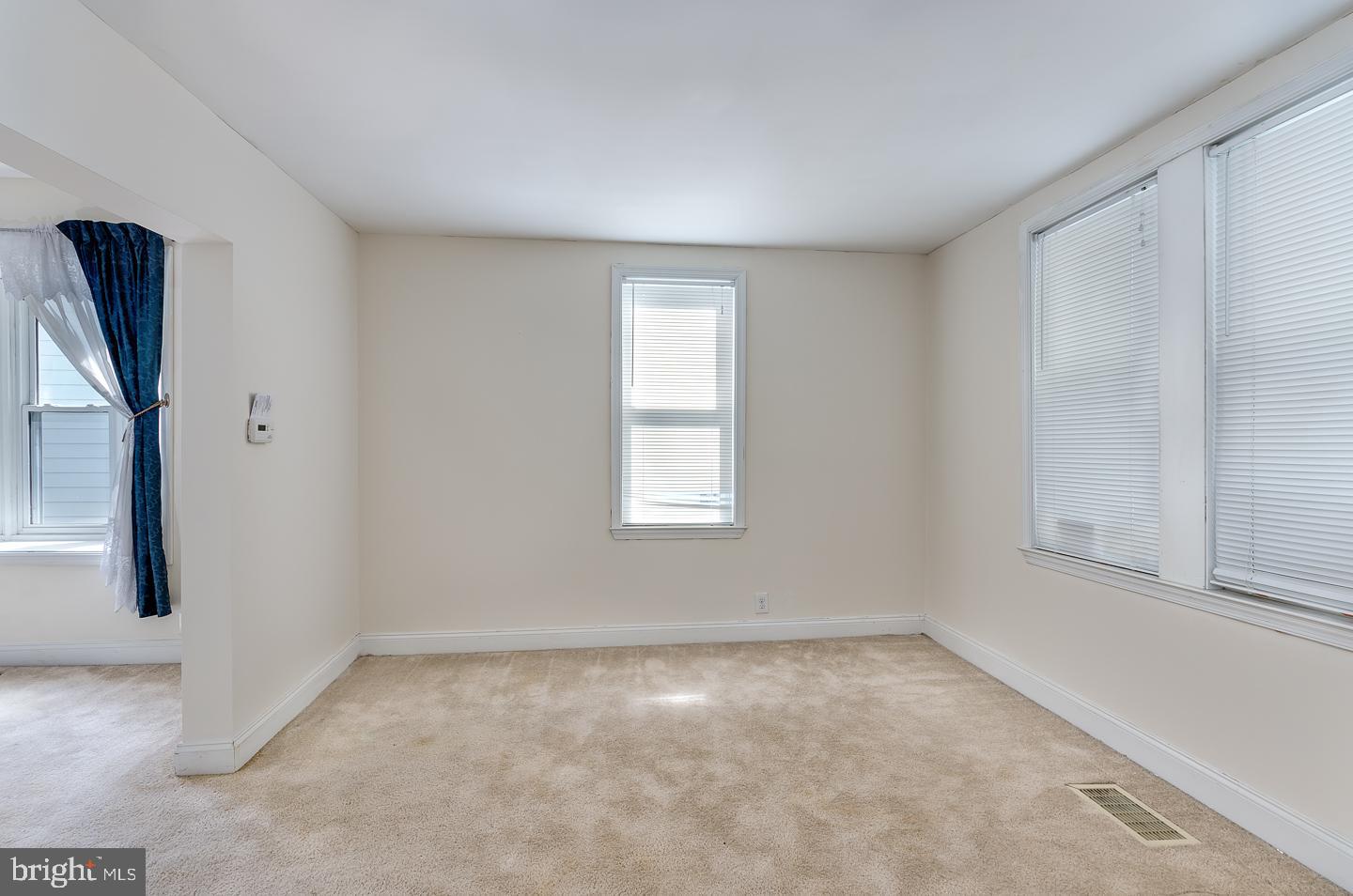 569 South Fairview Street Riverside, NJ 08075 - Photo 6 of 26 an empty room with a window