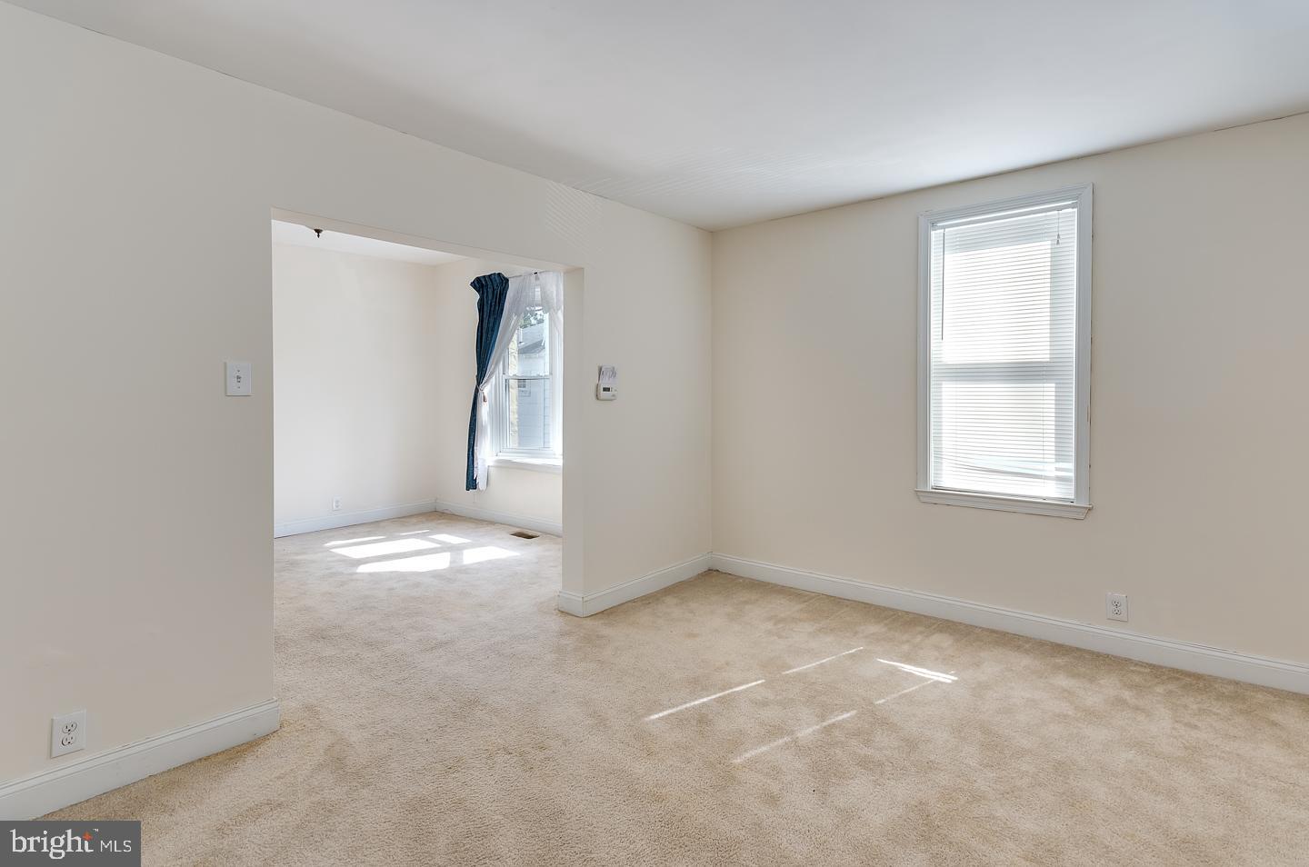 569 South Fairview Street Riverside, NJ 08075 - Photo 7 of 26 a view of an empty room with a window
