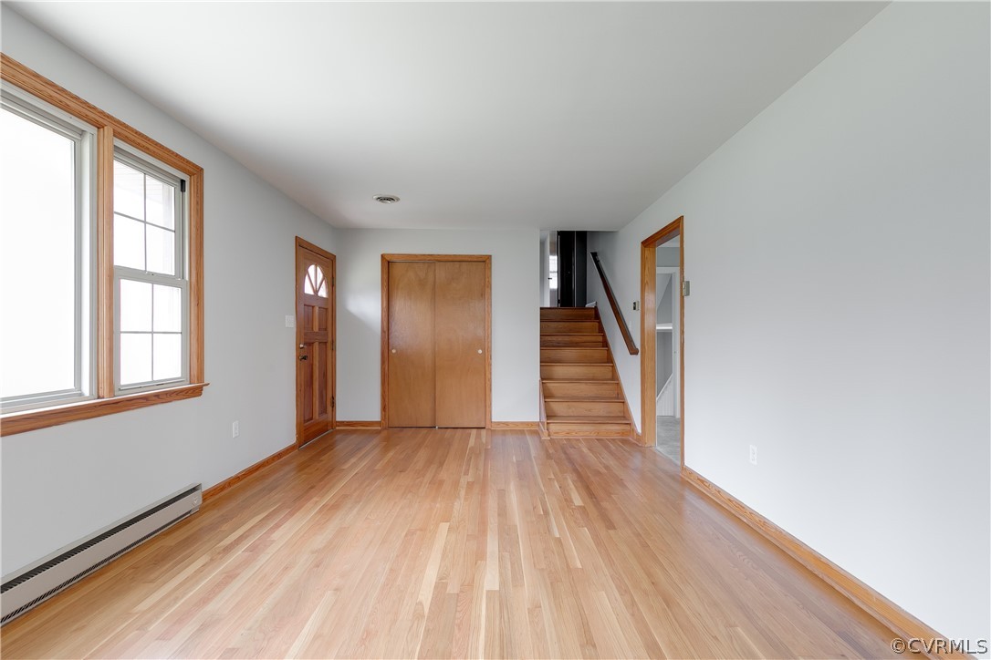 4440 Treely Road Chester, VA 23831 - Photo 13 of 39 a view of an empty room with wooden floor and a window