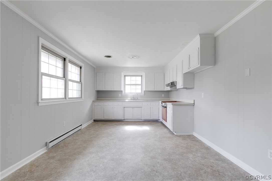 4440 Treely Road Chester, VA 23831 - Photo 15 of 39 a kitchen with white cabinets and white appliances